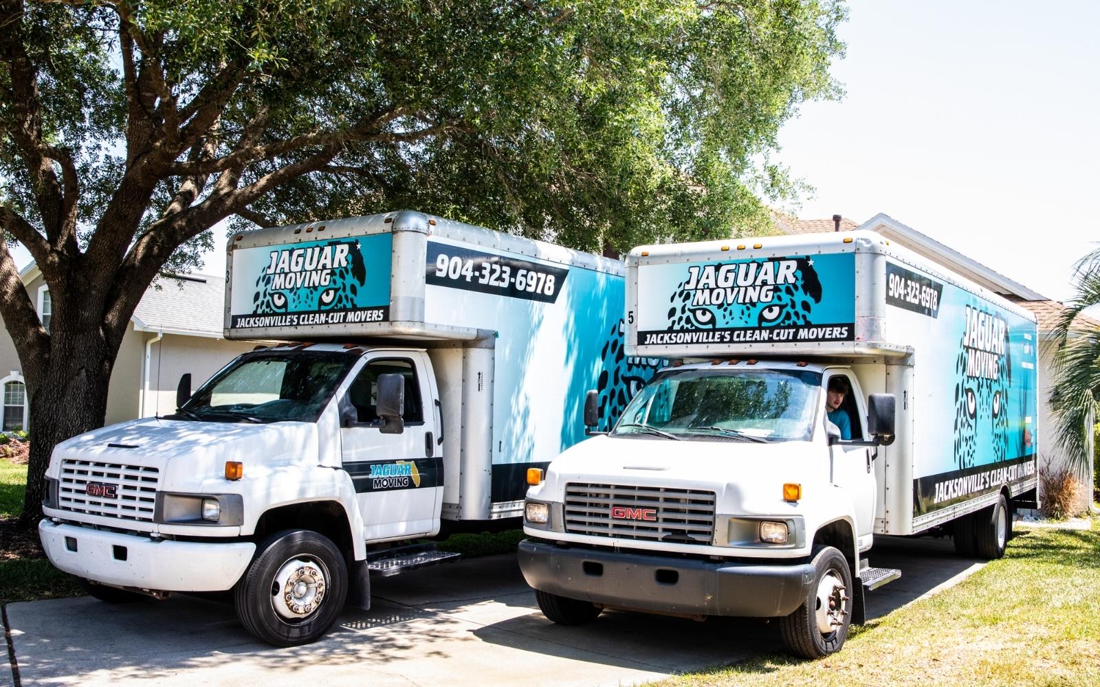 Jaguar Moving branded moving truck parked for loading and unloading​ in Jacksonville neighborhood
